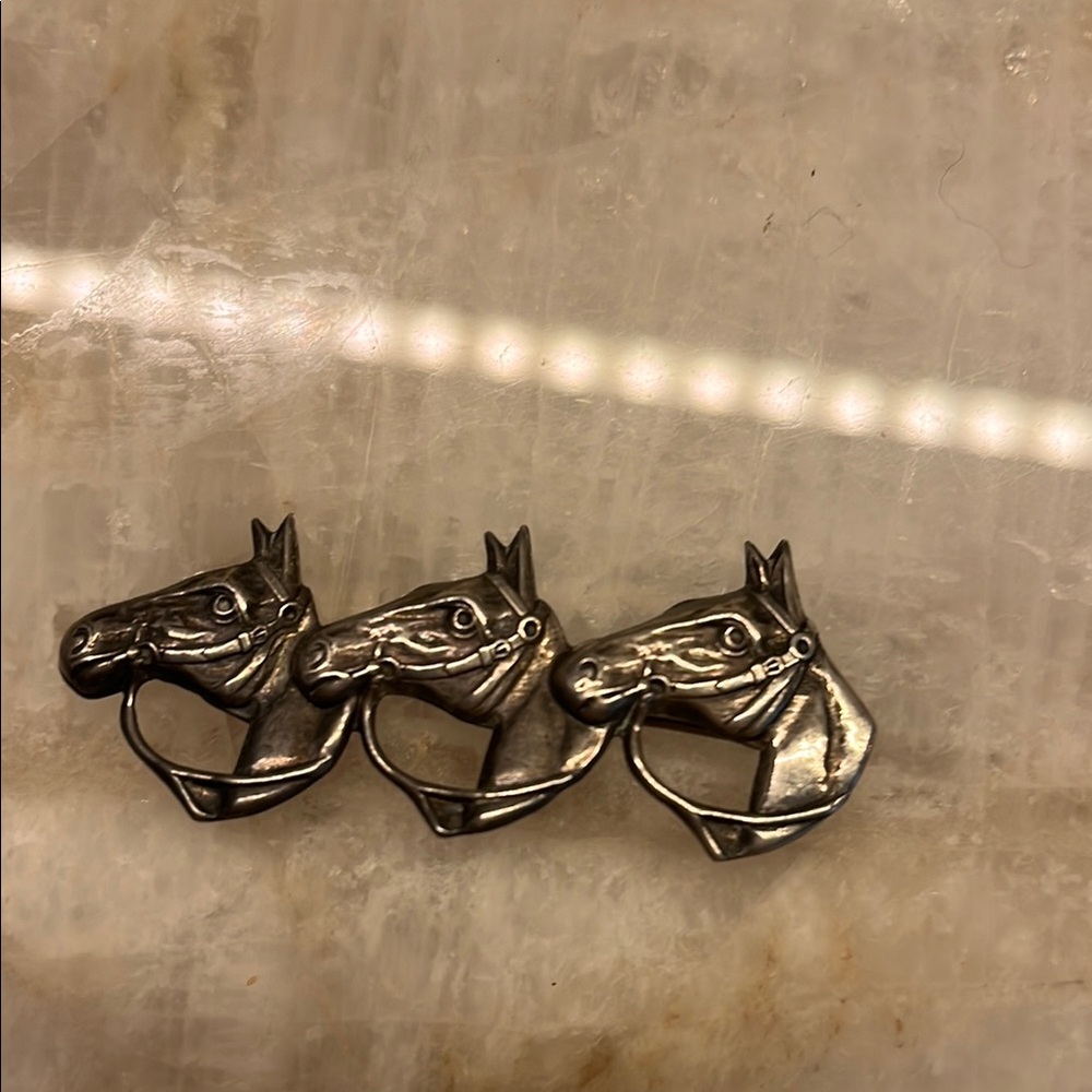 Sterling silver horse pin brooch.  Made by Lang.  4.5 grams.  2 1/4” long.